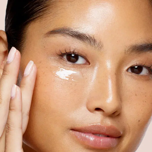 Dark circle cream gently applied under eye for overnight hydration and brightening.