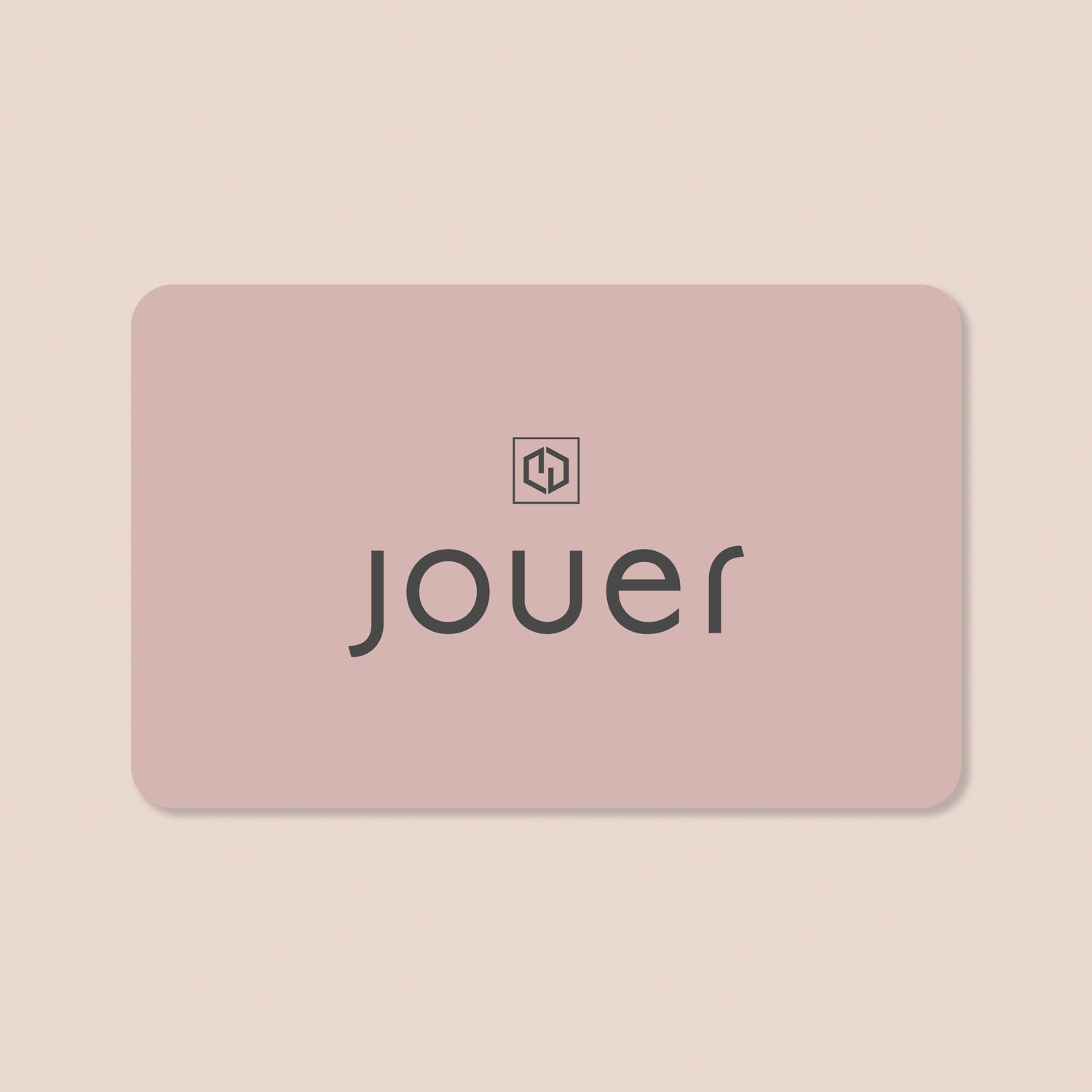 $25.00, alt: The Jouer Cosmetics gift card is rectangular with a soft pink background, featuring the brand name “jouer” in lowercase black letters centered on the card. Above the brand name, there is a small, minimalist logo with an abstract design. The rounded corners of the card add to its appeal, making it an ideal surprise for any recipient.