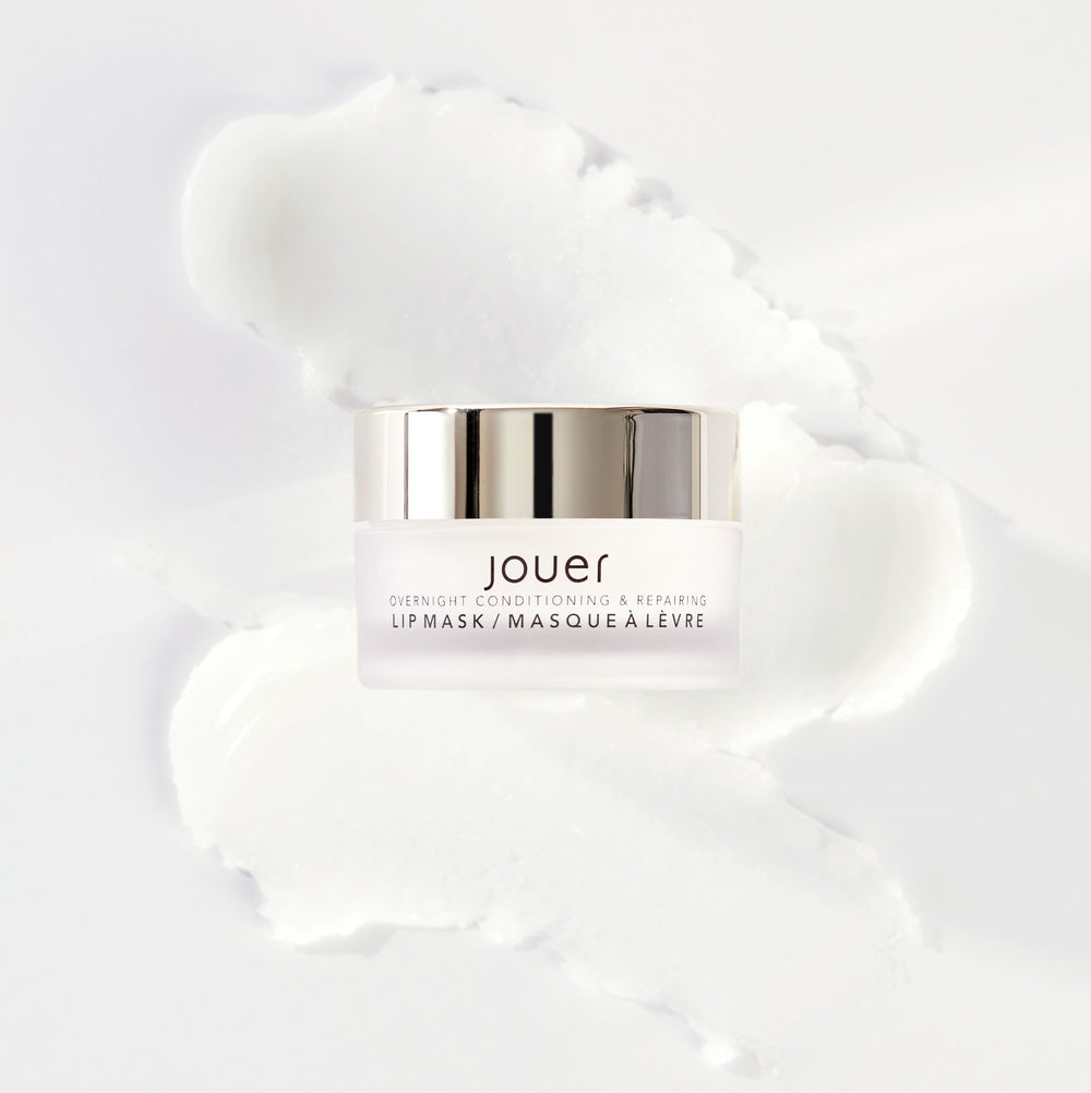 image of white jar with textured swatch of the Jouer Cosetics Overnight lip mask in the scent sweet mint. This component comes in a deluxe mini size, 10g in a jar.