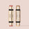 Two Jouer Cosmetics beauty sticks from Le Cheek Set stand against a peach background. One dual-ended stick is labeled "Blush & Bloom Duo" with blush and highlighter ends, while the other is labeled "Bloom Bronze & Glow Duo," featuring bronzer and highlighter ends. Both products boast sleek, gold packaging and are certified cruelty-free.