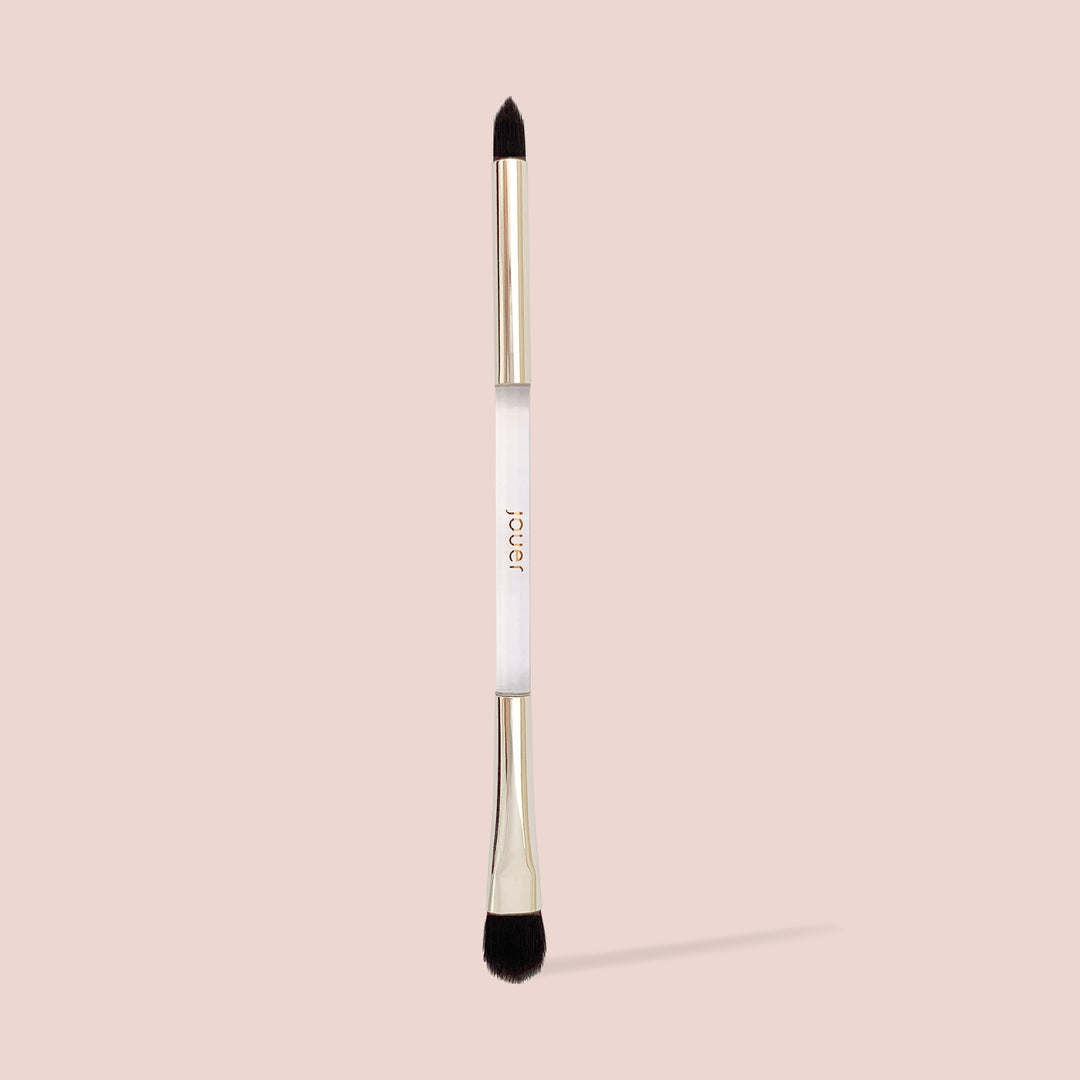 Jouer Jet Set dual-ended eye brush with pointed smudger and blending brush for eyeshadow application.
