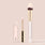 Liquid concealer and brush set in Snow, a very light neutral shade with pink undertones, featuring a doe-foot applicator and tapered blending brush on a beige background.