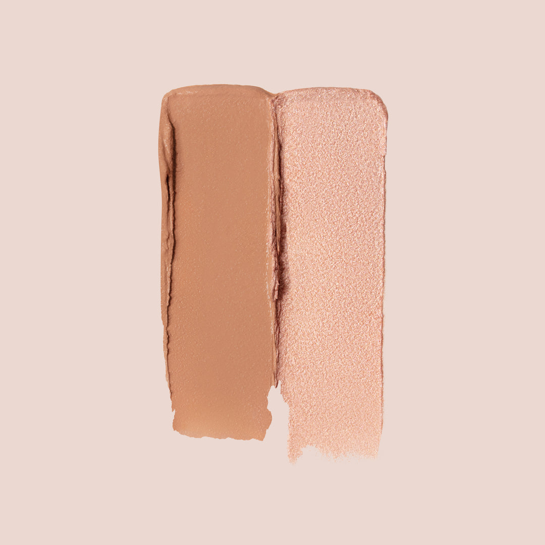 Sunrise, A beige background showcases two vertical swatches of Jouer Cosmetics' Bloom, Bronze & Glow. The left swatch features a creamy, matte vegan bronzer, while the right swatch displays a shimmery, light peachy-pink highlighter. Both swatches have textured surfaces with visible brush strokes.