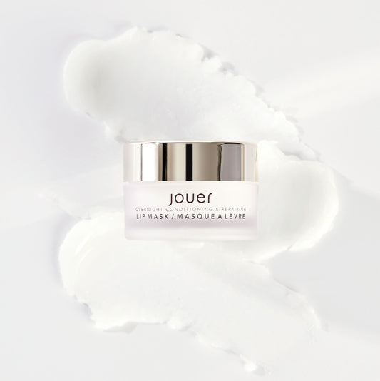  image of white jar with textured swatch of the Jouer Cosetics Overnight lip mask in the scent sweet mint. This component comes in a deluxe mini size, 10g in a jar. 