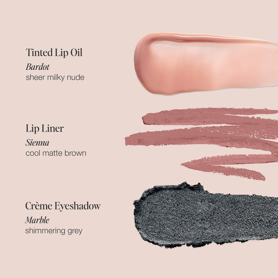 makeup set swatches showing nude tinted lip oil, brown lip liner, and grey eyeshadow on beige background