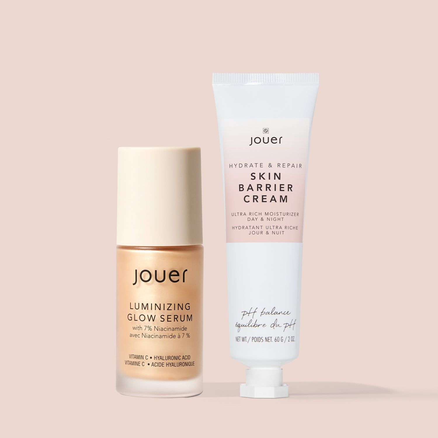 Hyaluronic acid face serum and skin barrier face cream by Jouer displayed side by side on a soft blush background.