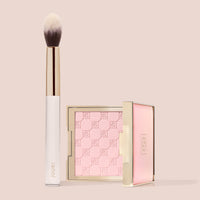 Jouer Precision Brightening Set in Pink featuring the embossed powder compact and Jouer-branded tapered brush.