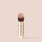 Cruelty-free complexion brush with travel-friendly gold handle and ultra-soft bristles for seamless makeup application.