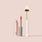 Jouer Light Bright Brightening Under-Eye Corrector shown open with doe-foot applicator alongside a white and gold concealer brush.