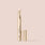 snow, A sleek, gold-colored tube of lip enhancer with the cap removed reveals a light pink, angled lip product. The name "Jouer Cosmetics" and the title "Essential Concealer Pen" are printed on the side of the tube. This vegan beauty essential is set against a solid, soft beige background.