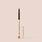 fawn, A Jouer Cosmetics Lip Liner with a beige cap stands upright on a matching beige background. The product, branded with "Jouer," features a twist mechanism for dispensing the liner. The cap is placed on the ground nearby. This cruelty-free, paraben-free beauty essential promises precision and style.