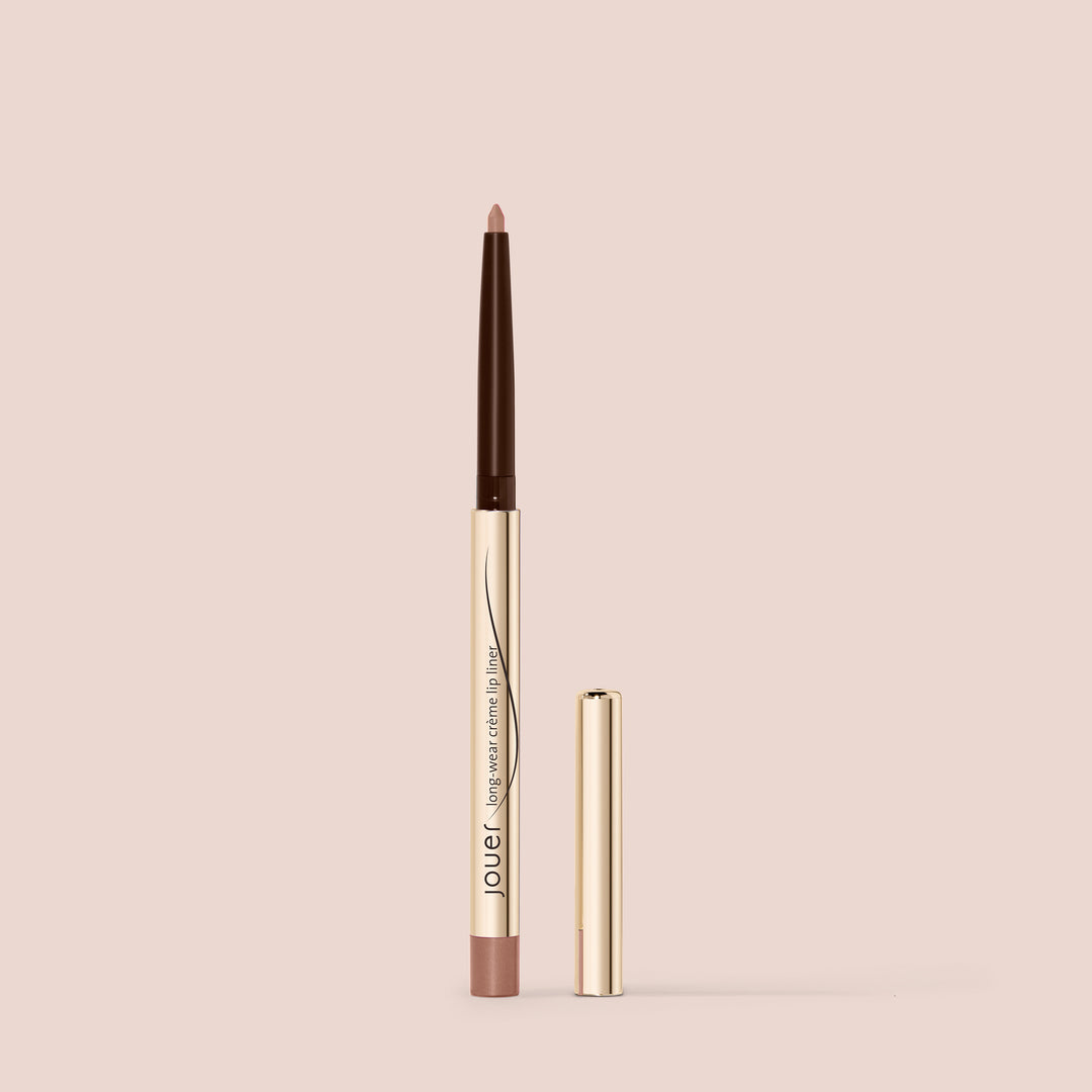 Nude lip liner with a twist-up applicator in a gold and blush pink casing from Jouer Cosmetics.