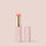 Peony, The Essential Shine Balm from Jouer Cosmetics comes in a sleek tube of gold and pastel pink, adorned with elegant floral designs. The brand name "Jouer" is printed in gold on the tube. This vegan, cruelty-free, and paraben-free balm stands upright with its cap removed, showcasing the soft pink shade against a light beige background.